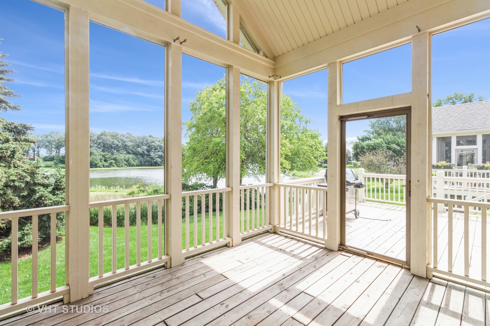 1 Sugar Maple Court Lake In The Hills, IL 60156 - Photo 20 of 29 a view of a room with wooden floor and windows
