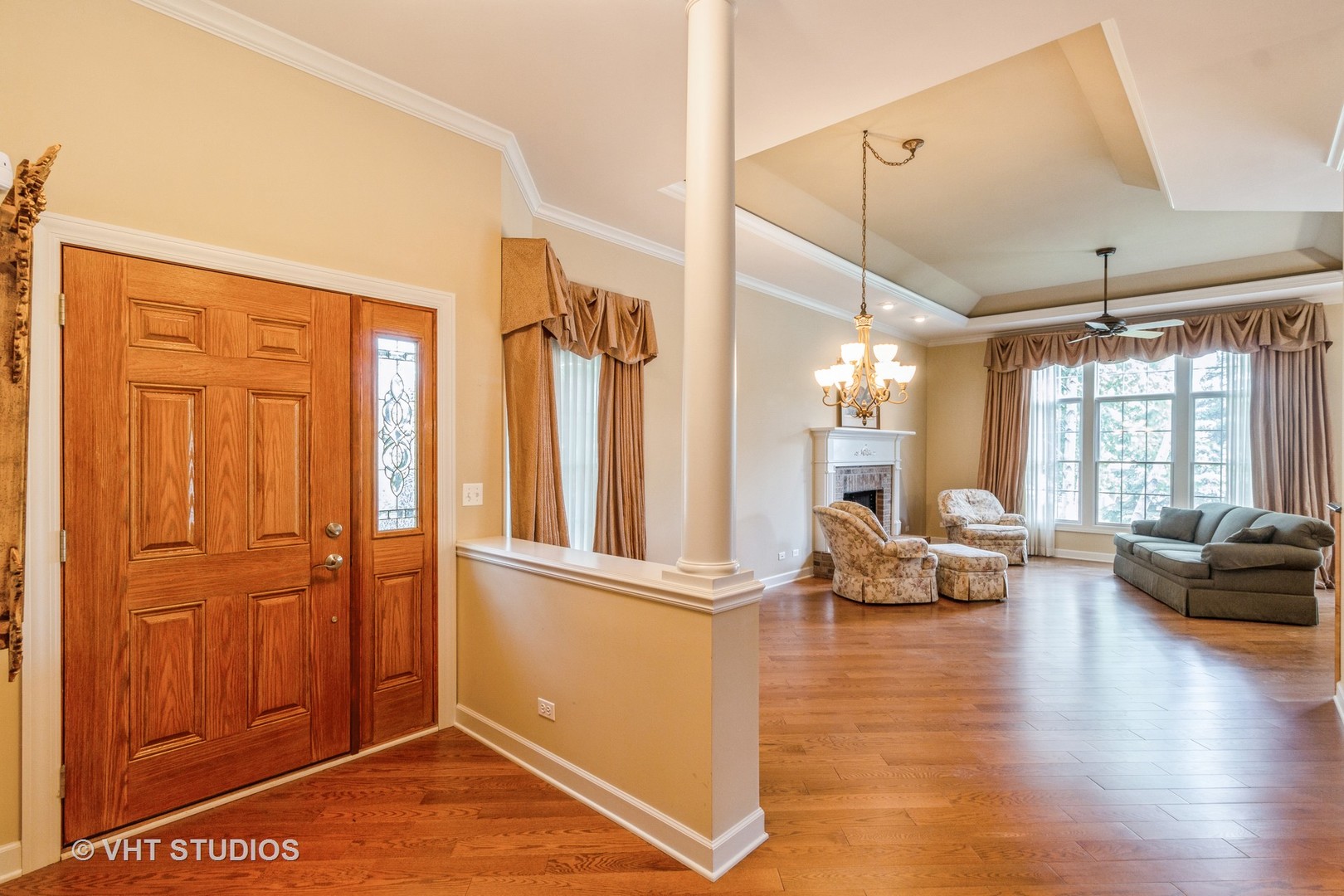 1 Sugar Maple Court Lake In The Hills, IL 60156 - Photo 2 of 29 a living room with furniture window and wooden floor