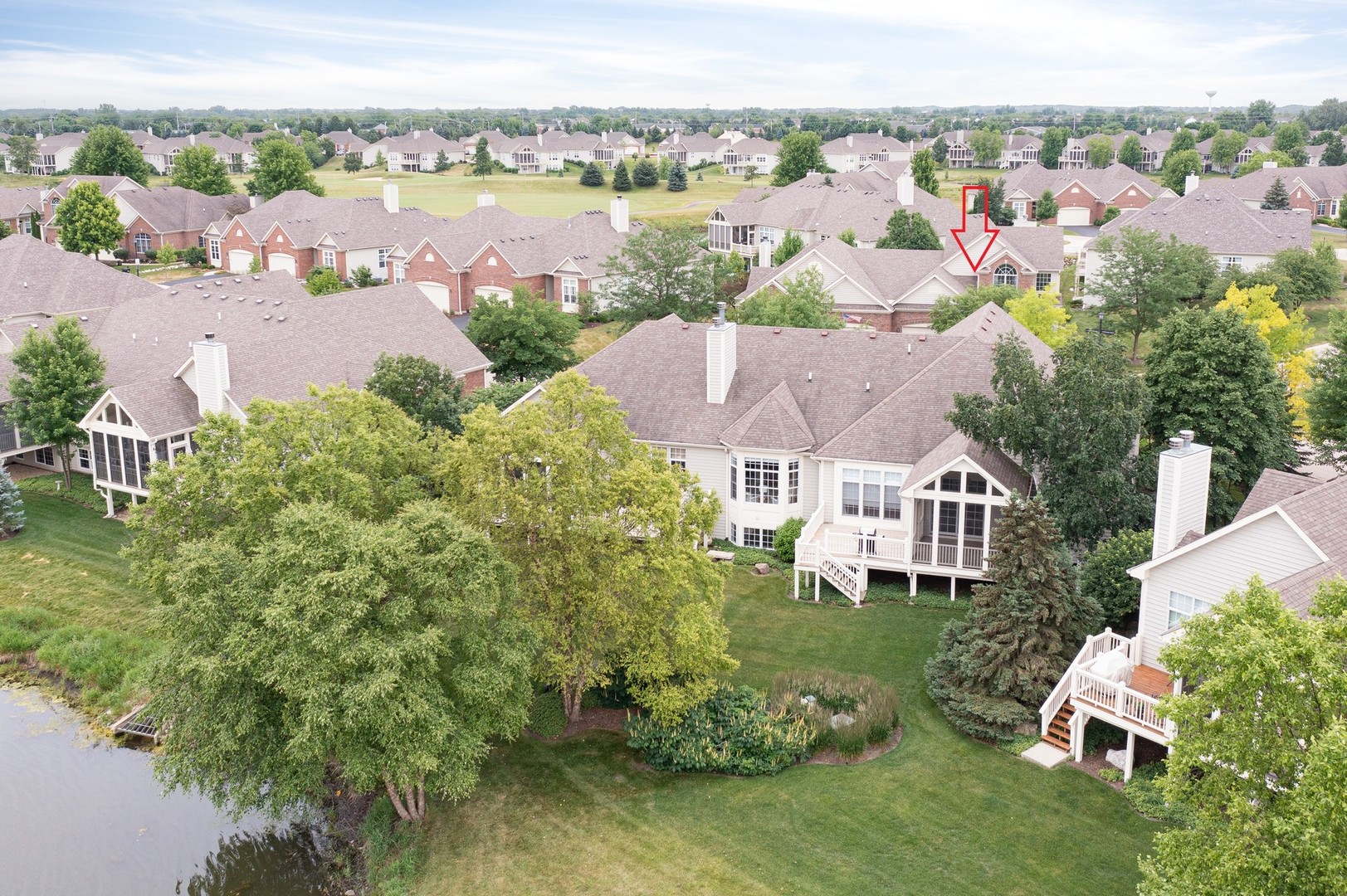 1 Sugar Maple Court Lake In The Hills, IL 60156 - Photo 23 of 29 an aerial view of a house with outdoor space and lake view