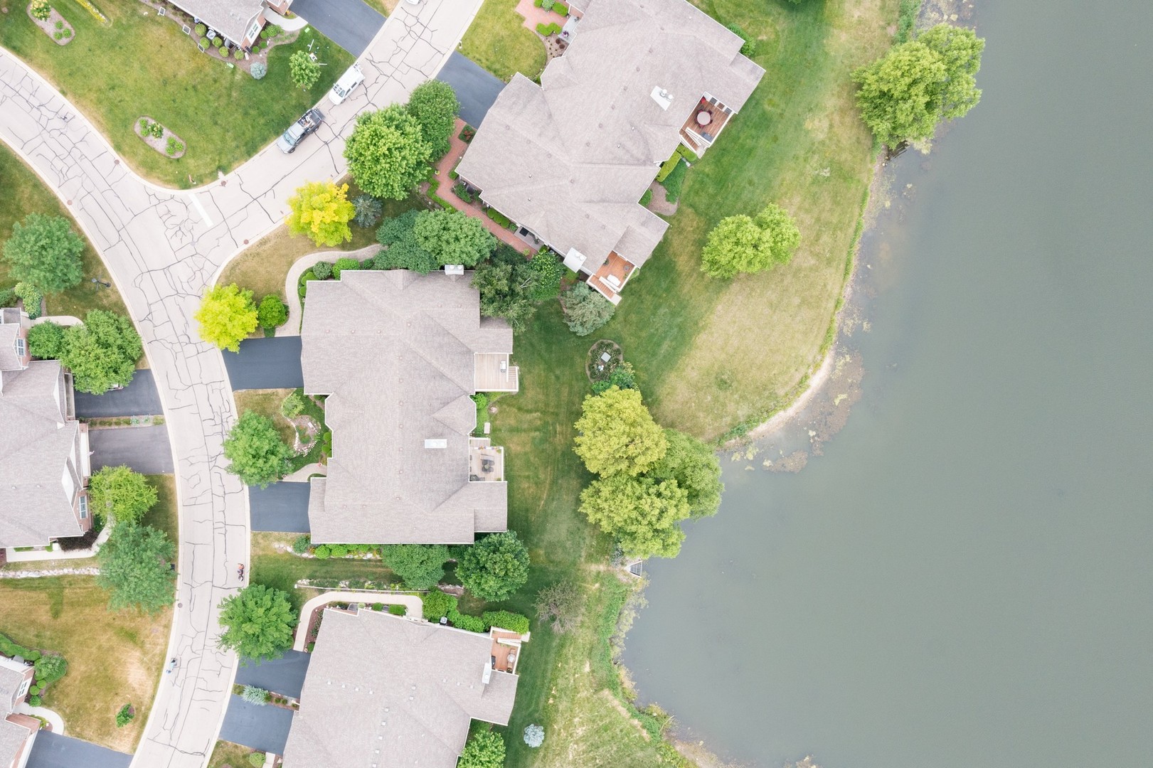 1 Sugar Maple Court Lake In The Hills, IL 60156 - Photo 24 of 29 an aerial view of a house with a yard and garden