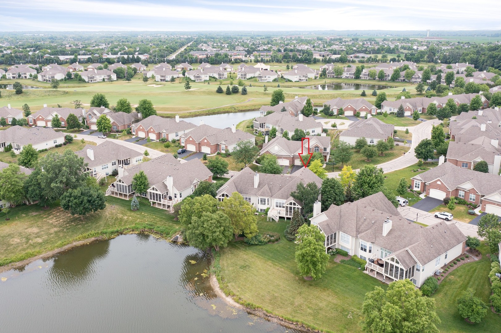 1 Sugar Maple Court Lake In The Hills, IL 60156 - Photo 27 of 29 an aerial view of residential houses with outdoor space and river