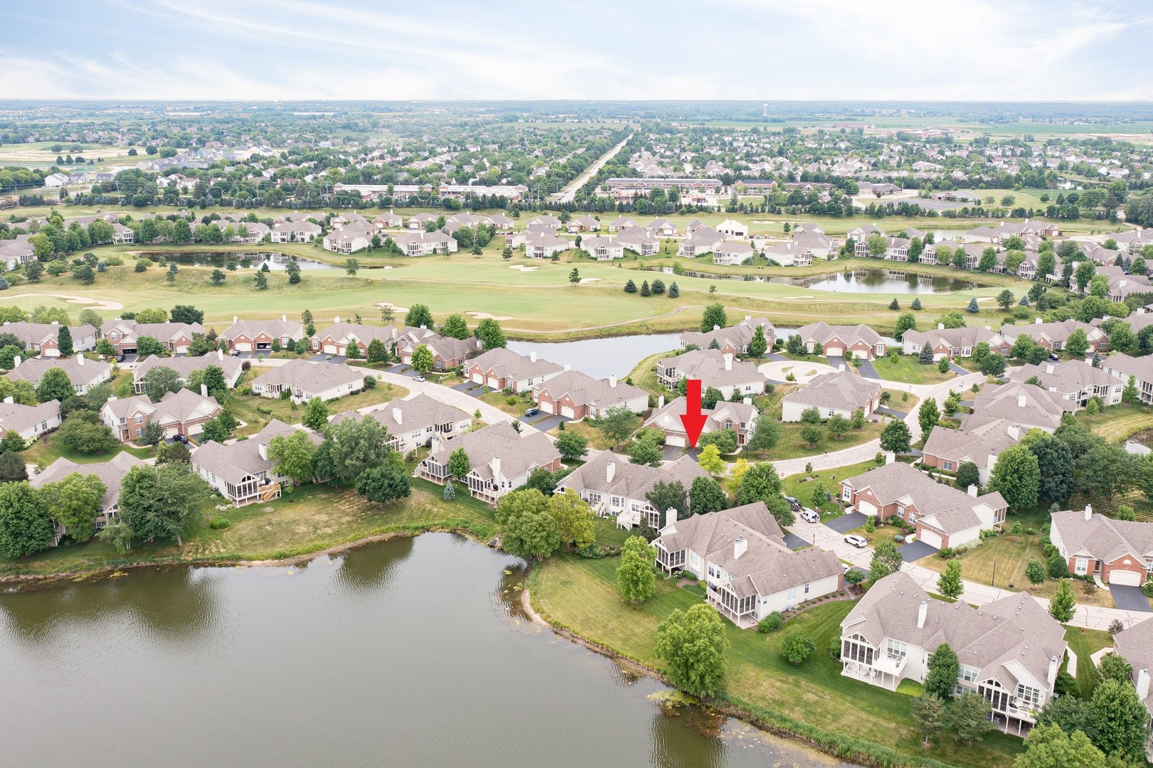 1 Sugar Maple Court Lake In The Hills, IL 60156 - Photo 28 of 29 an aerial view of residential houses with outdoor space and river