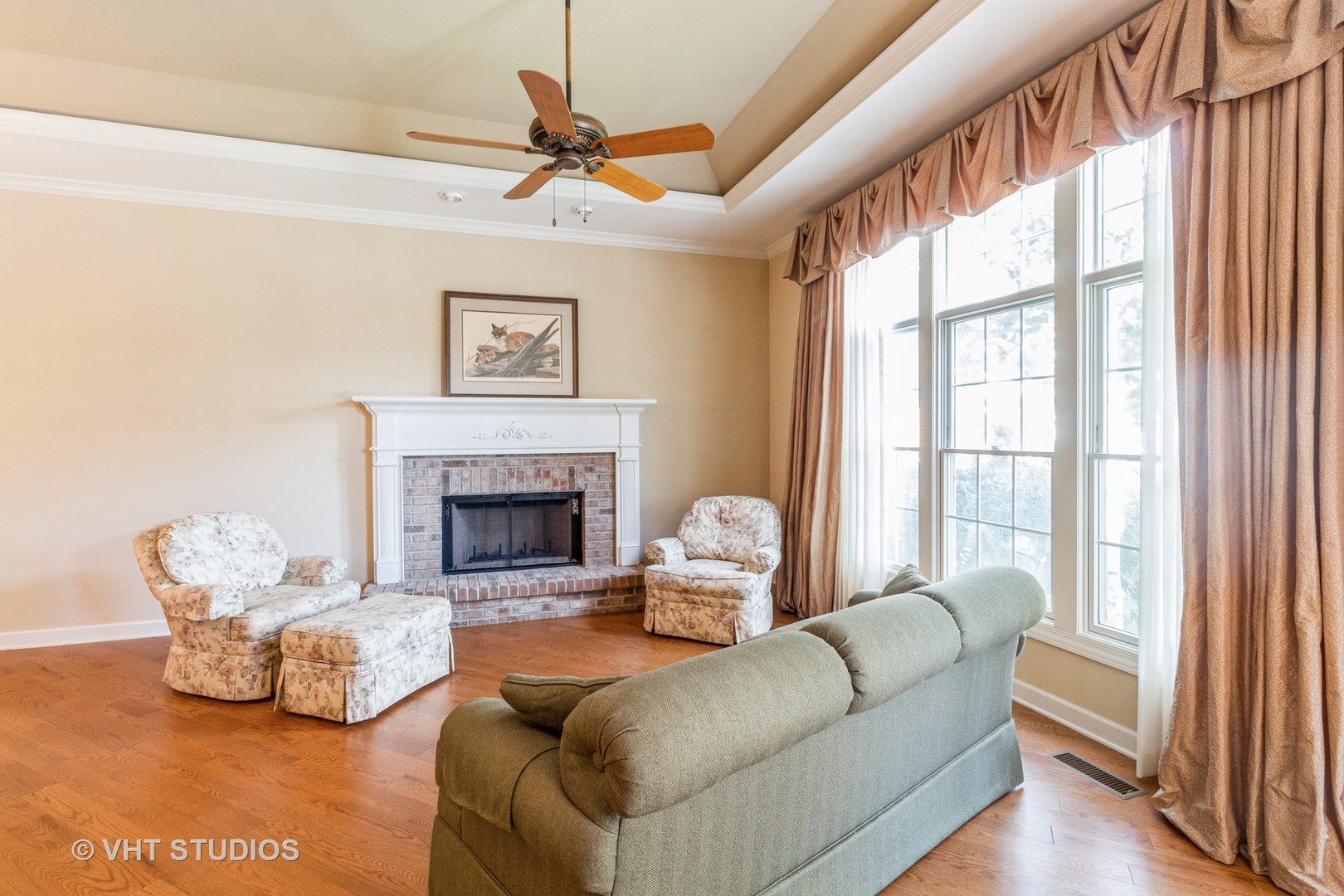 1 Sugar Maple Court Lake In The Hills, IL 60156 - Photo 4 of 29 a living room with furniture and a fireplace