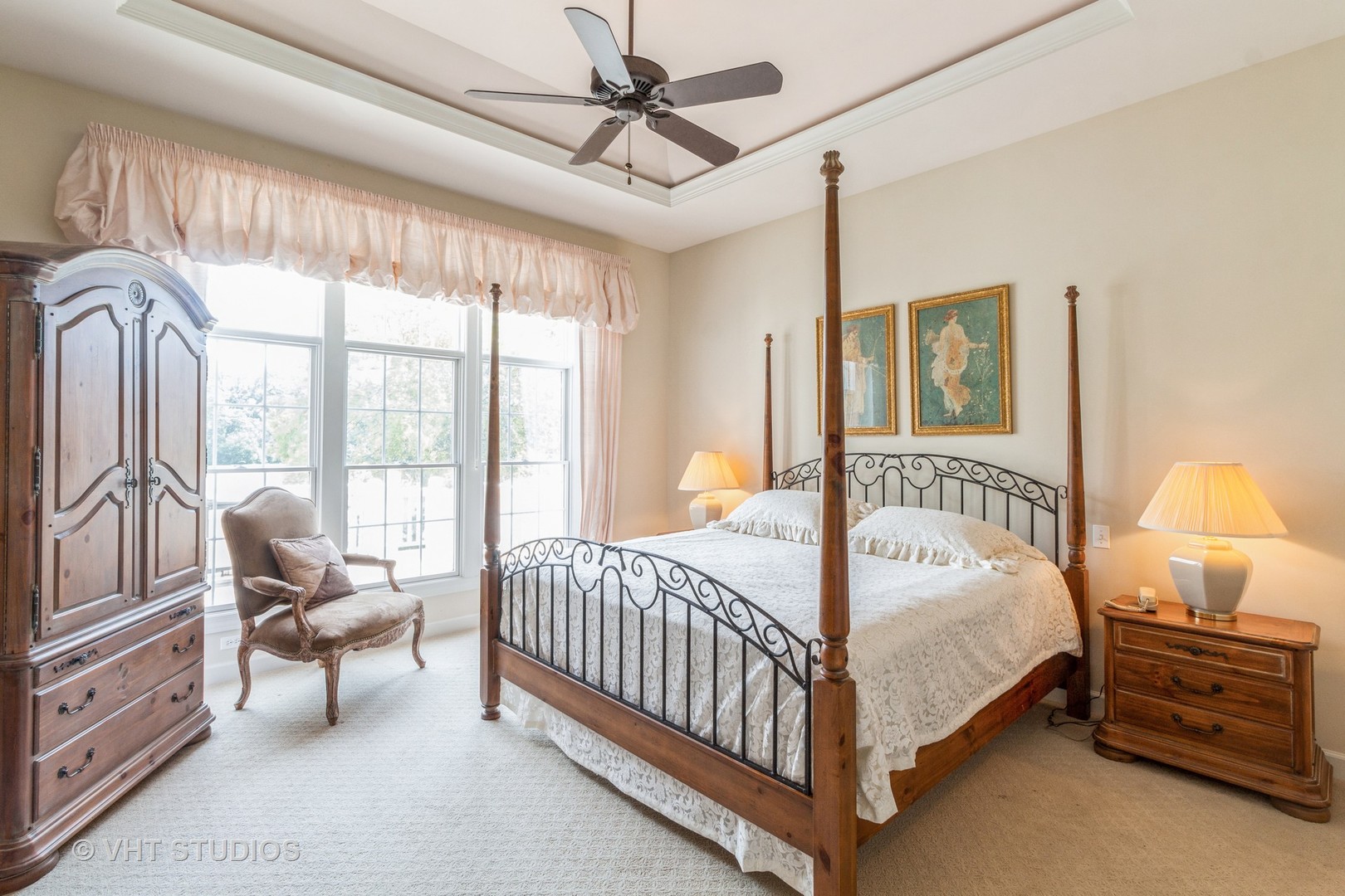 1 Sugar Maple Court Lake In The Hills, IL 60156 - Photo 9 of 29 a bedroom with a bed and a chandelier