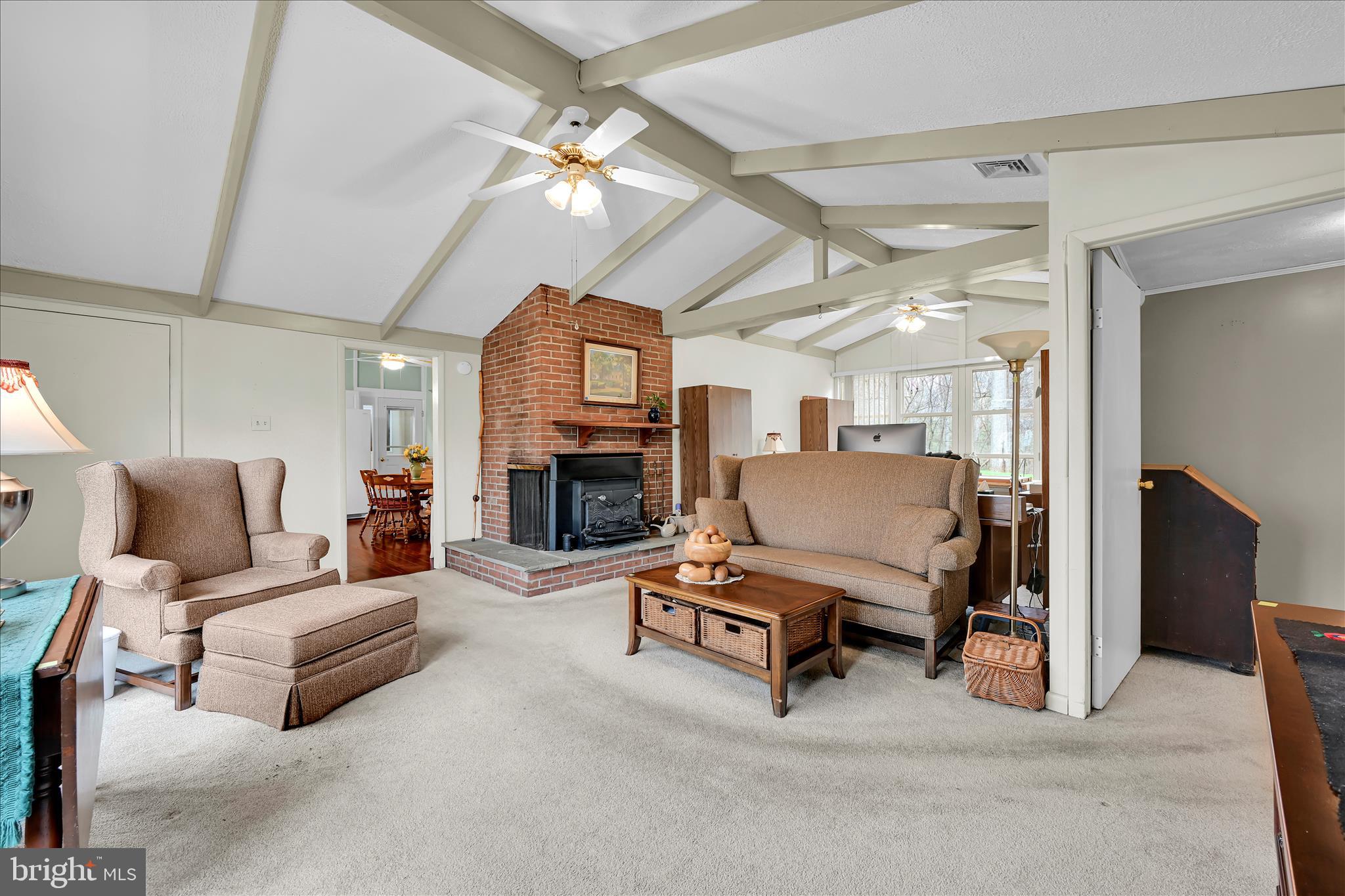 1534 Benton Hollow Road Drumore, PA 17518 - Photo 17 of 50 a living room with furniture and a fireplace