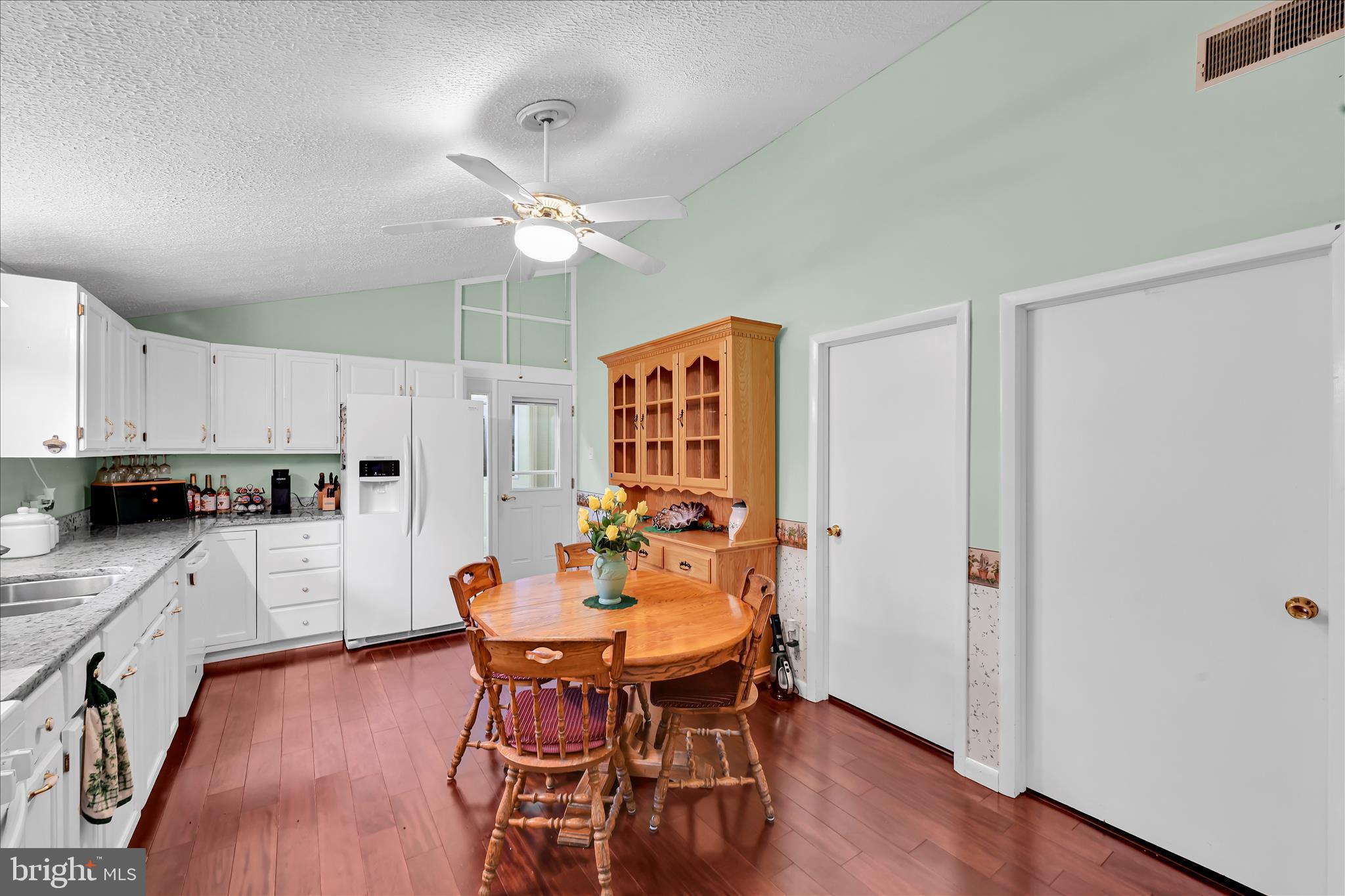 1534 Benton Hollow Road Drumore, PA 17518 - Photo 19 of 50 a view of a dining room with furniture and wooden floor