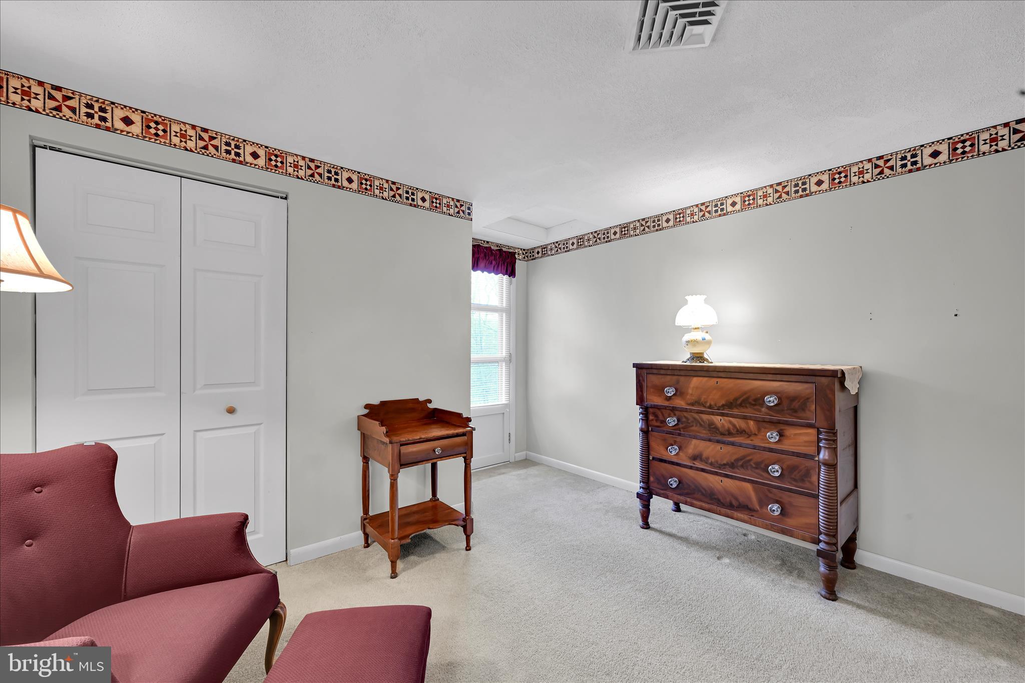 1534 Benton Hollow Road Drumore, PA 17518 - Photo 24 of 50 a bedroom with furniture and a dresser