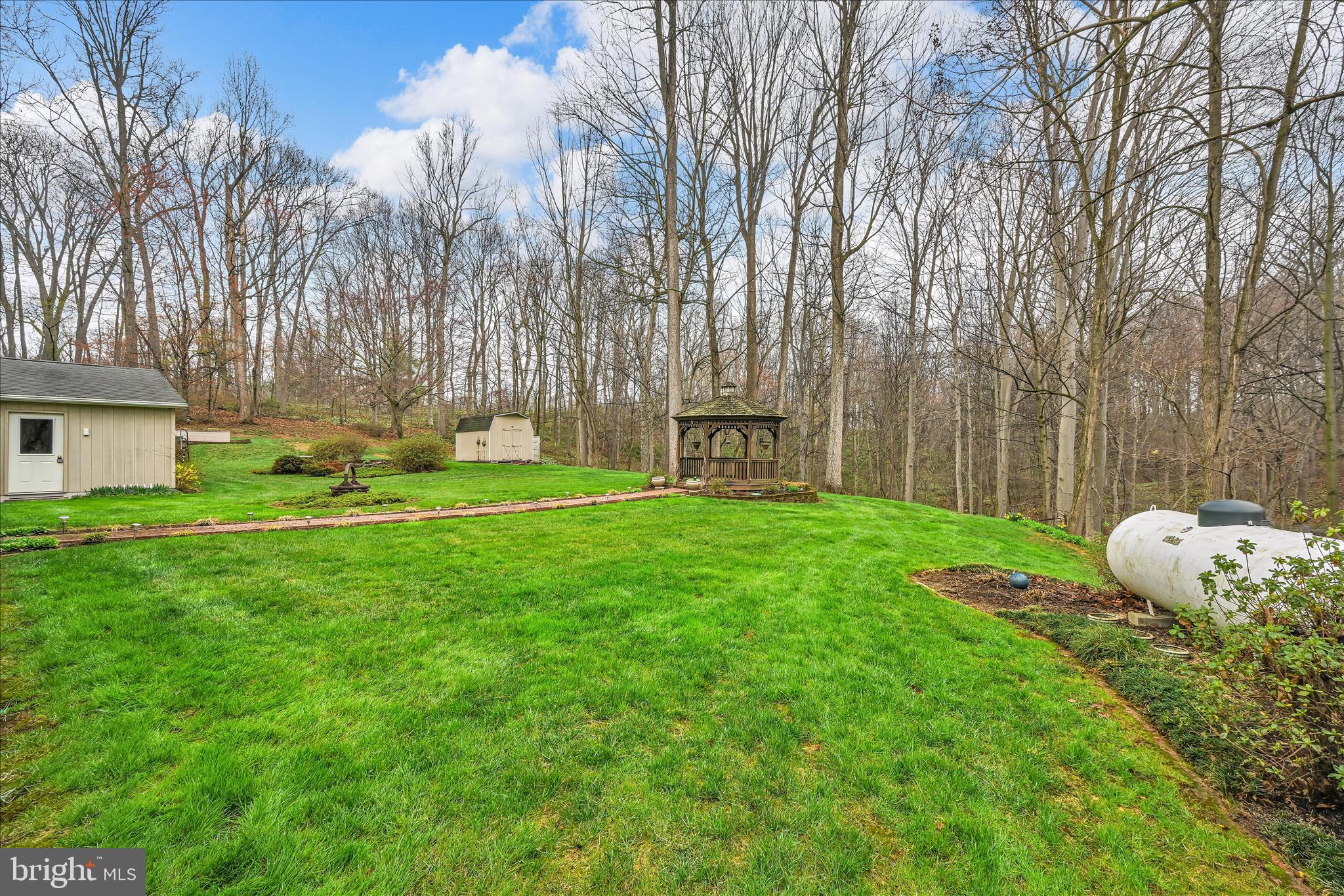 1534 Benton Hollow Road Drumore, PA 17518 - Photo 35 of 50 a backyard of a house with table and chairs