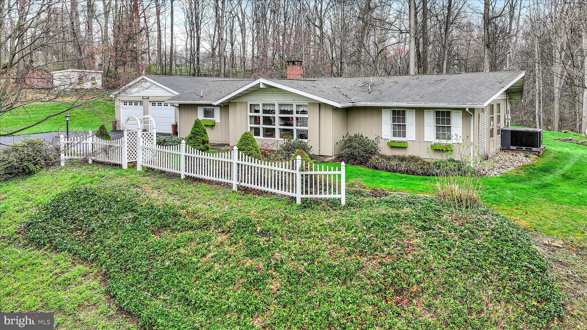1534 Benton Hollow Road Drumore, PA 17518 - Photo 4 of 50 a front view of a house with a yard and green space