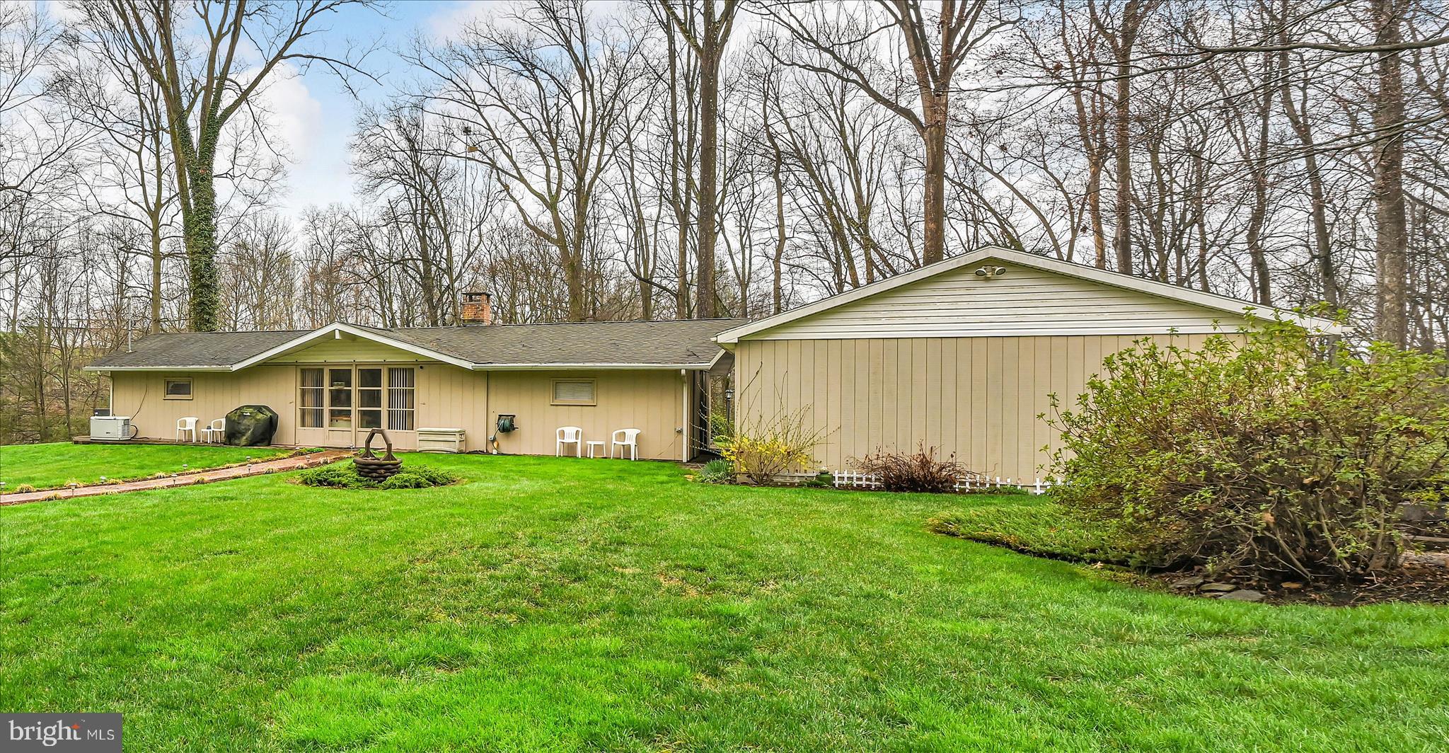 1534 Benton Hollow Road Drumore, PA 17518 - Photo 41 of 50 a front view of a house with a yard and trees