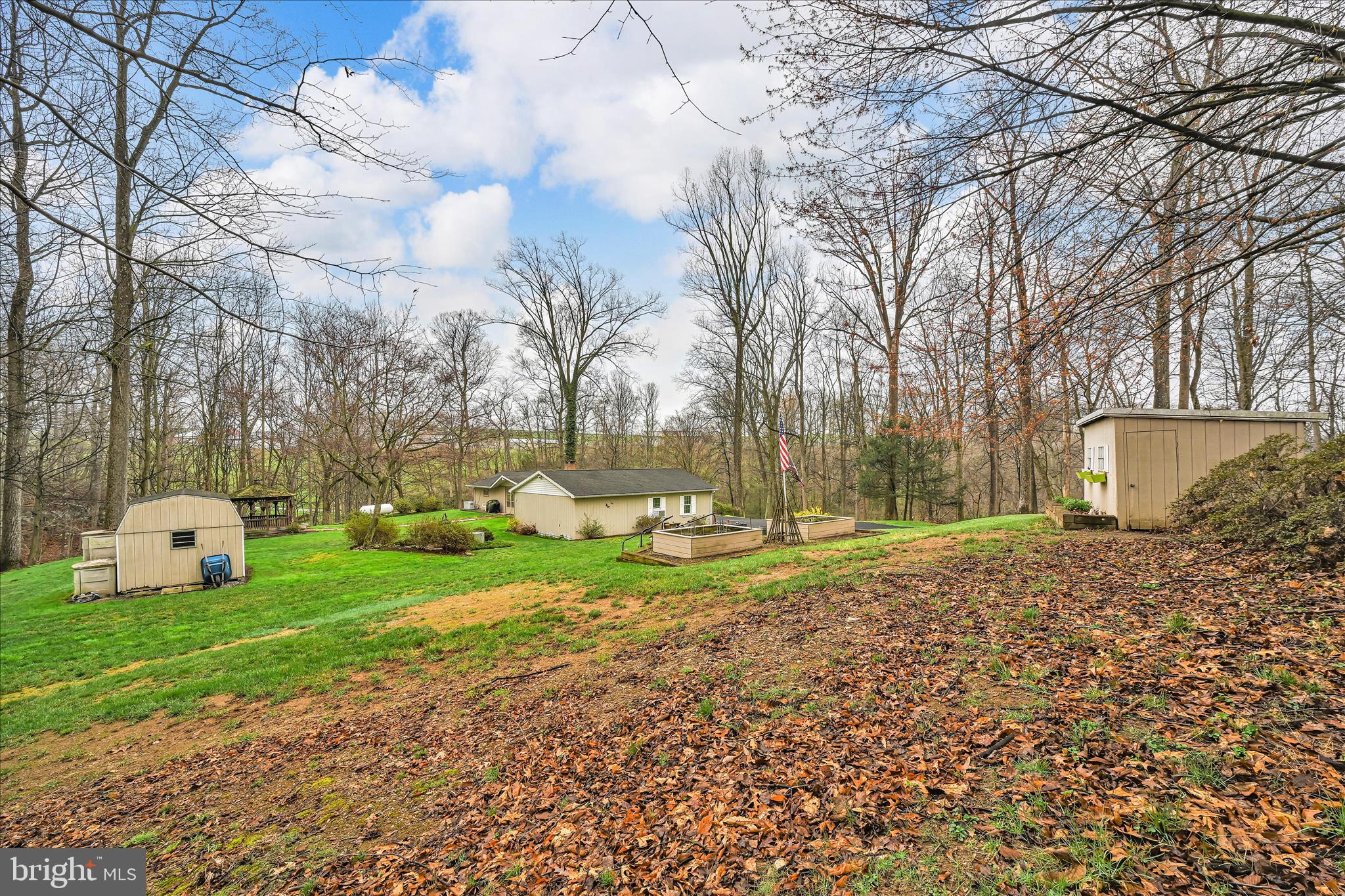 1534 Benton Hollow Road Drumore, PA 17518 - Photo 42 of 50 a view of a white house with a yard and sitting area