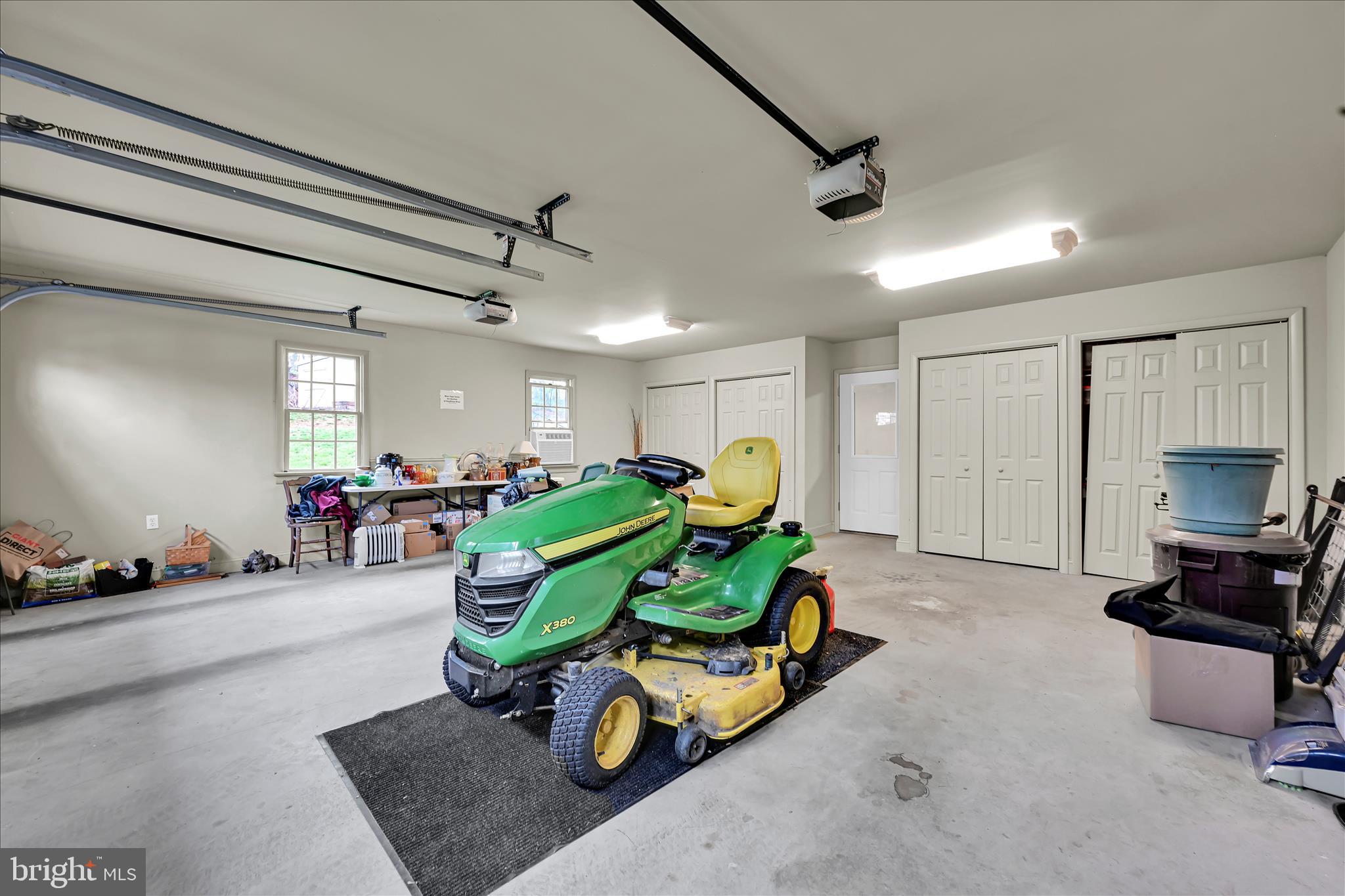 1534 Benton Hollow Road Drumore, PA 17518 - Photo 45 of 50 a room with gym equipment and a chandelier