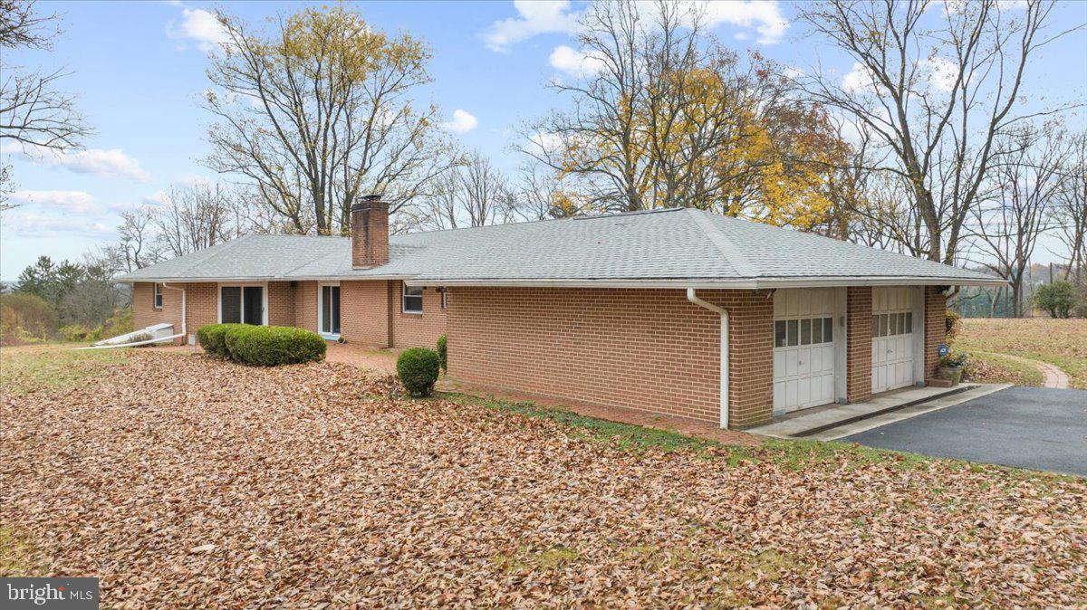 935 Ebelhare Road Pottstown, PA 19465 - Photo 13 of 52 a front view of a house with a yard