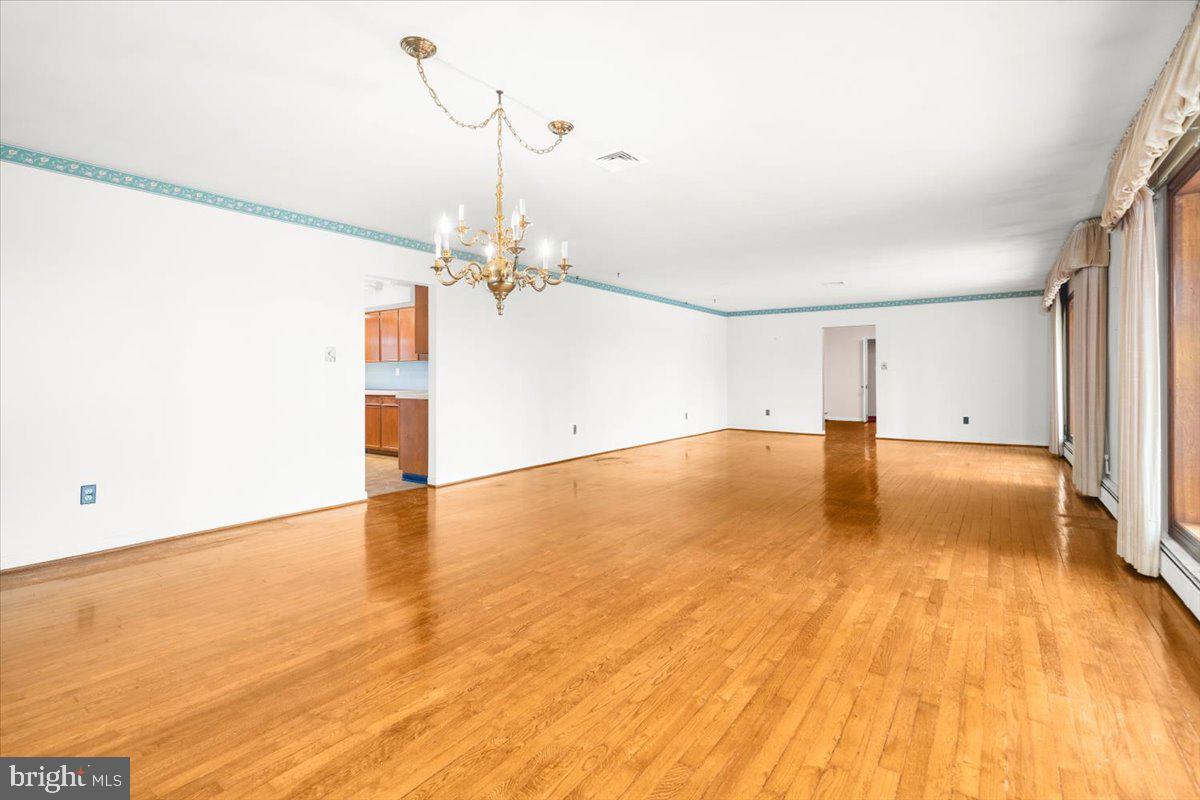935 Ebelhare Road Pottstown, PA 19465 - Photo 23 of 52 a view of empty room with wooden floor
