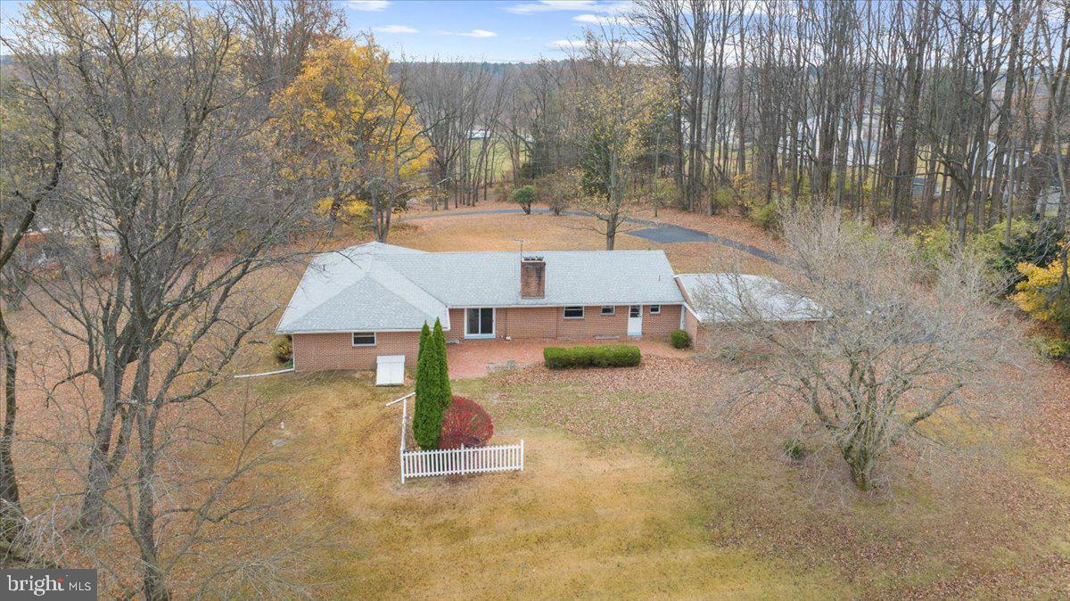 935 Ebelhare Road Pottstown, PA 19465 - Photo 6 of 52 a view of a house with a yard and sitting area