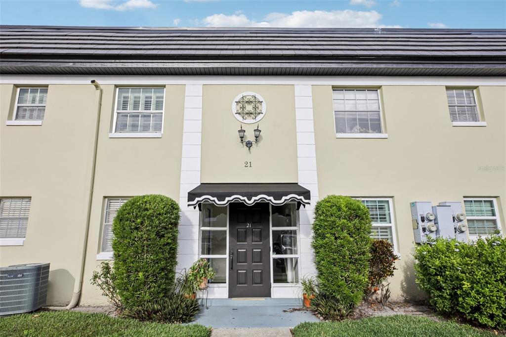 1500 Gay Road, Unit 21C Winter Park, FL 32789 - Photo 1 of 27 a front view of a house
