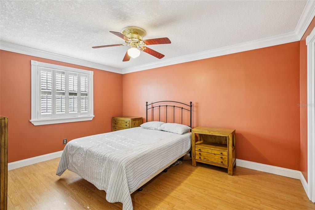 1500 Gay Road, Unit 21C Winter Park, FL 32789 - Photo 12 of 27 a bedroom with a bed and a window