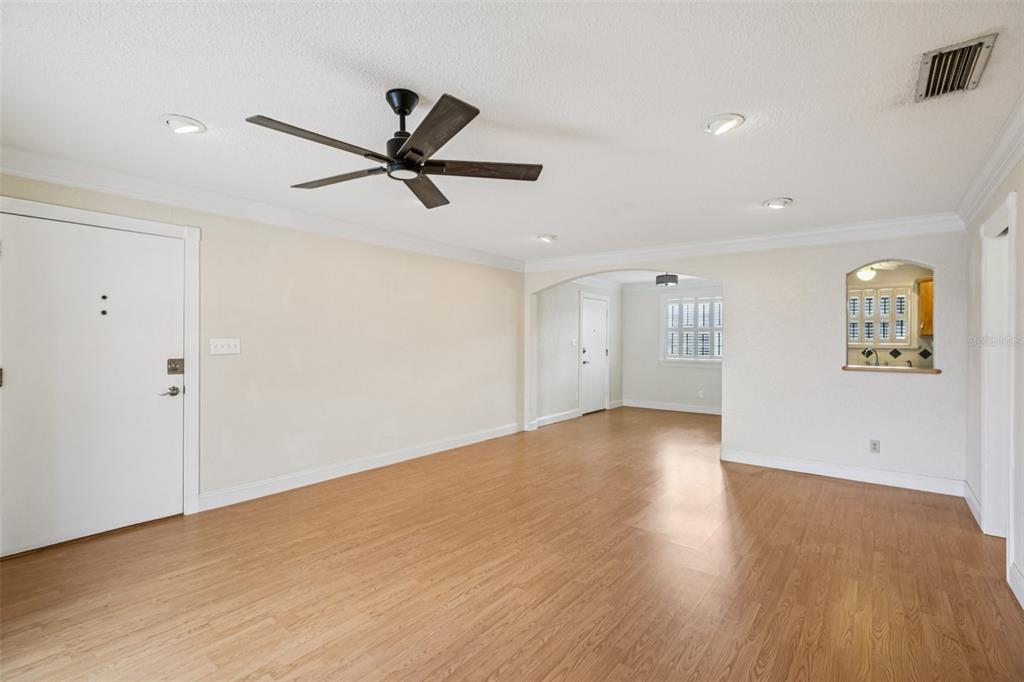 1500 Gay Road, Unit 21C Winter Park, FL 32789 - Photo 6 of 27 a view of empty room with wooden floor