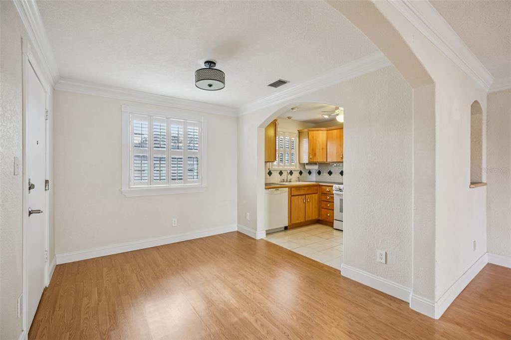 1500 Gay Road, Unit 21C Winter Park, FL 32789 - Photo 9 of 27 wooden floor in an empty room and a window