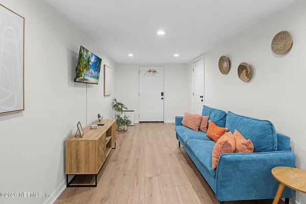 a living room with furniture and a couch