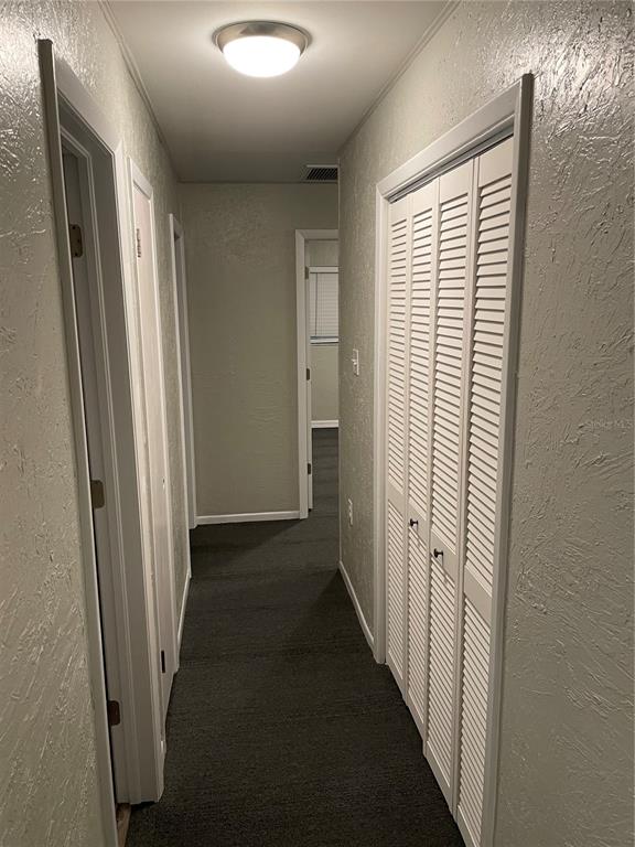3267 Rackley Road Brooksville, FL 34604 - Photo 16 of 23 a view of hallway with windows