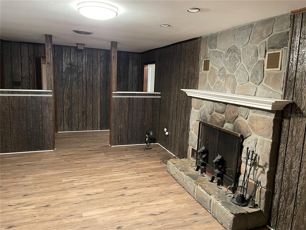 3267 Rackley Road Brooksville, FL 34604 - Photo 4 of 23 a view of a livingroom with a fireplace