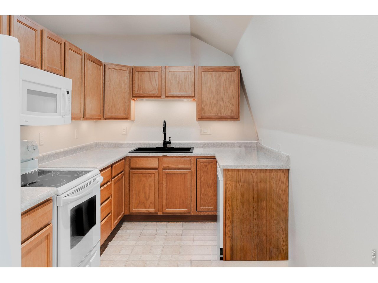 6789 Niwot Road Longmont, CO 80503 - Photo 22 of 28 Caretaker's unit kitchen.