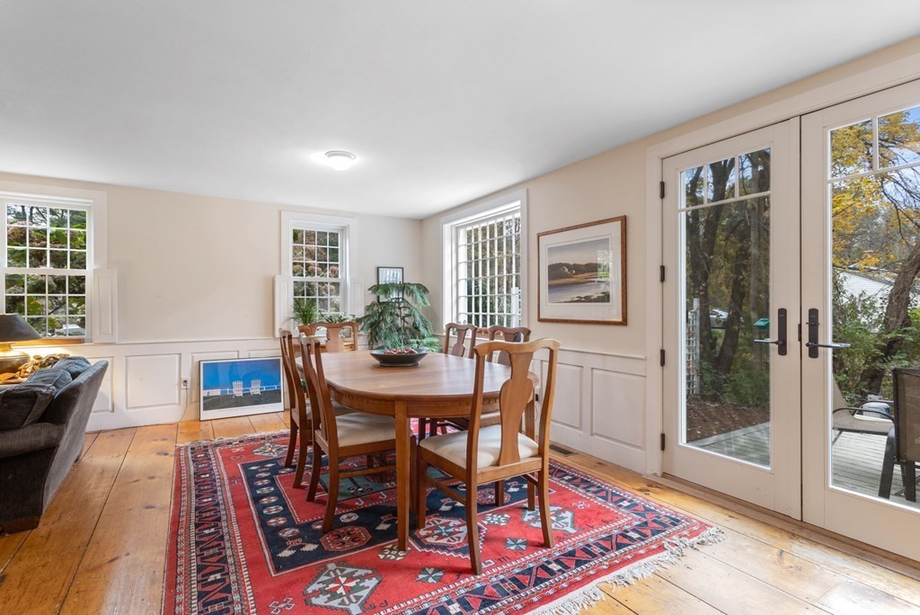 5 Manor Road Bolton, MA 01740 - Photo 8 of 30 a view of a dining room with furniture window and wooden floor