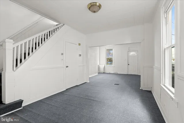 a picture of a bench in front of a door