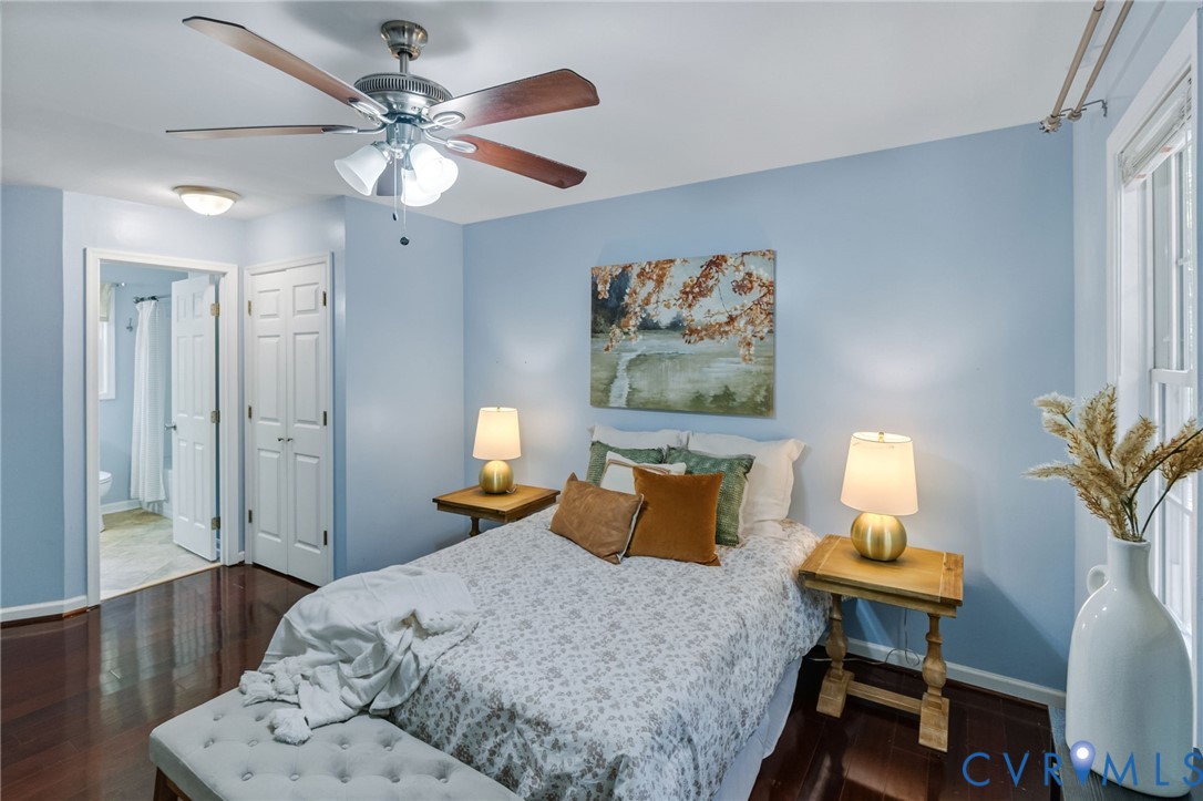 2869 Newville Road Disputanta, VA 23842 - Photo 15 of 26 Dark wood-finish flooring, ceiling fan with light