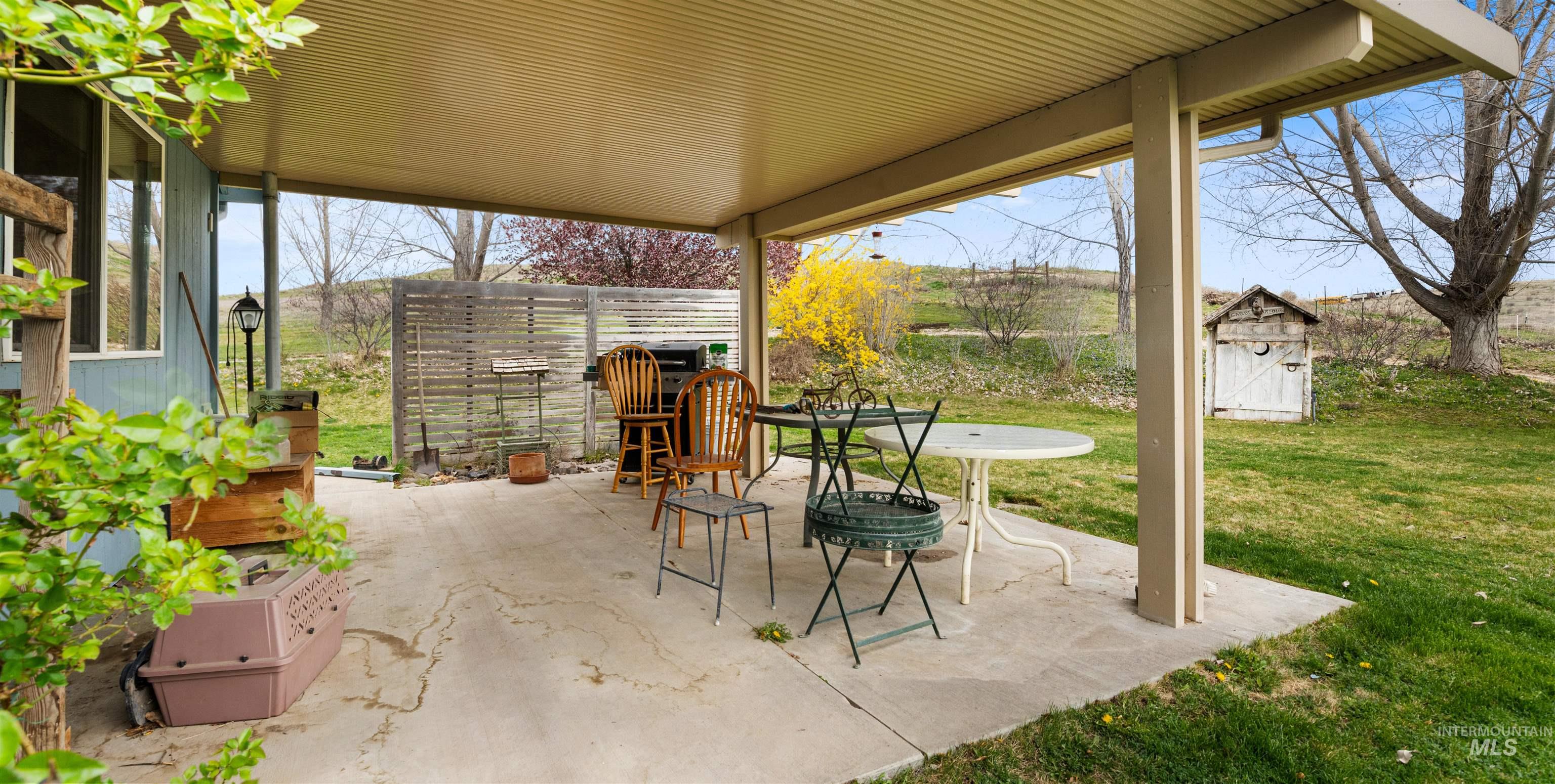 731 Tower Lane Caldwell, ID 83607 - Photo 14 of 38 View of patio / terrace with a storage shed