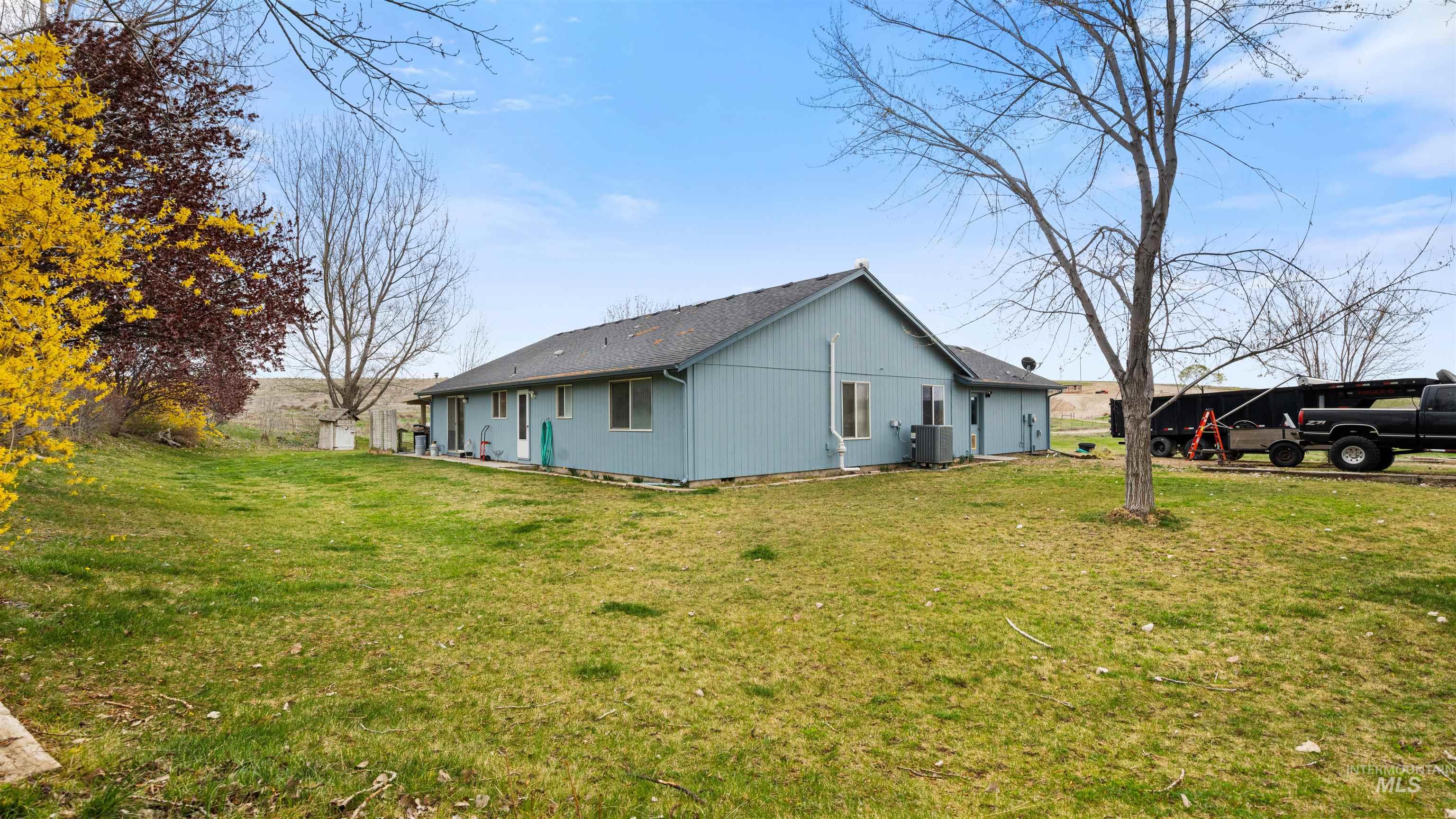 731 Tower Lane Caldwell, ID 83607 - Photo 16 of 38 View of property exterior with a lawn
