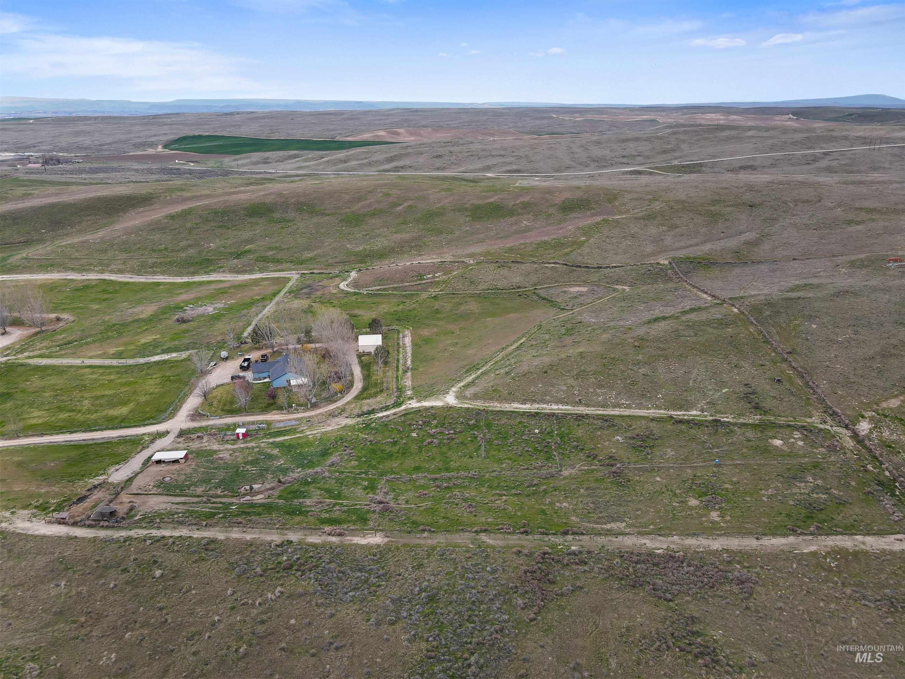 731 Tower Lane Caldwell, ID 83607 - Photo 3 of 38 Aerial view of property and surrounding area featuring rural landscape