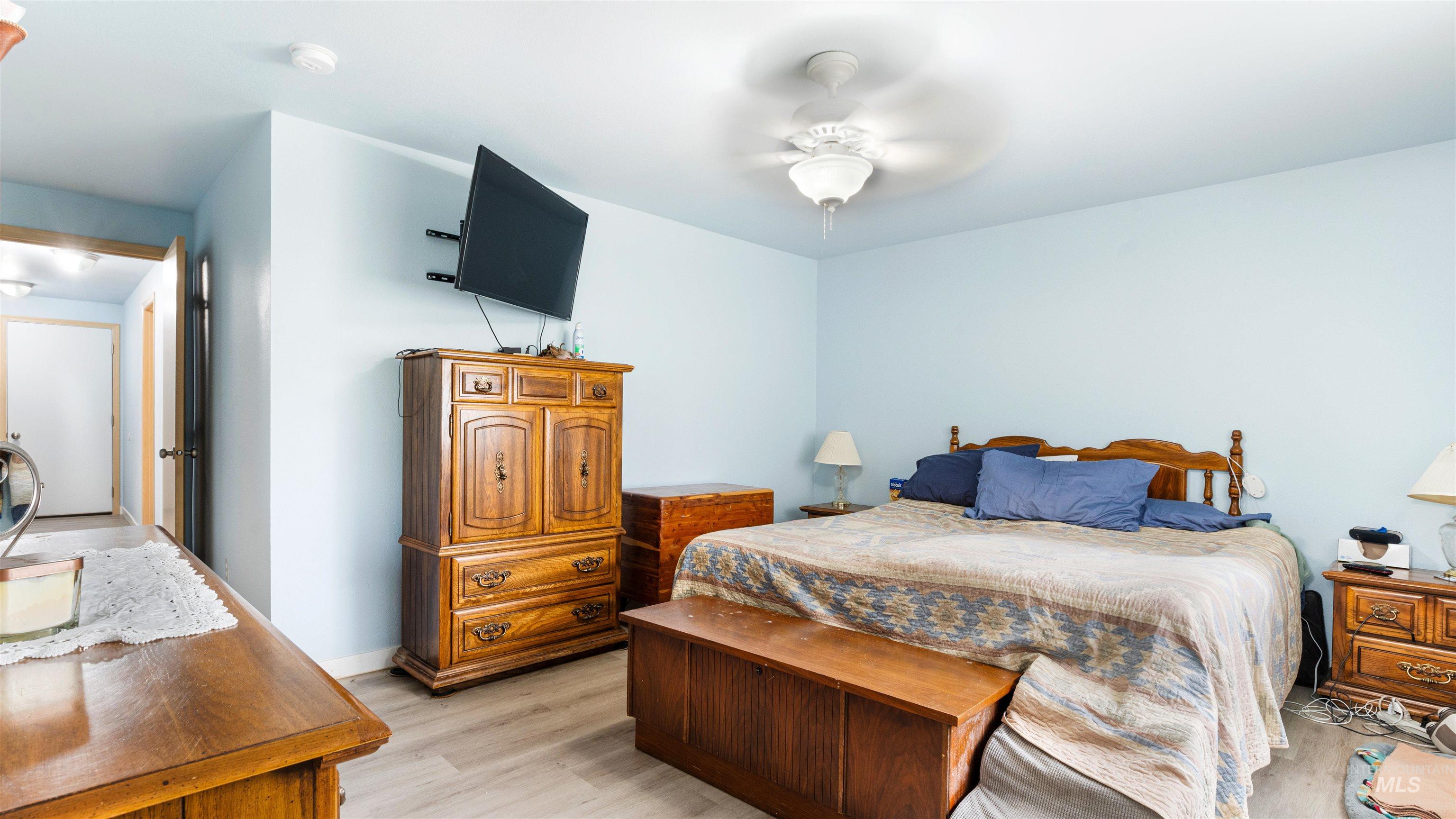 731 Tower Lane Caldwell, ID 83607 - Photo 33 of 38 Bedroom with light wood finished floors and a ceiling fan