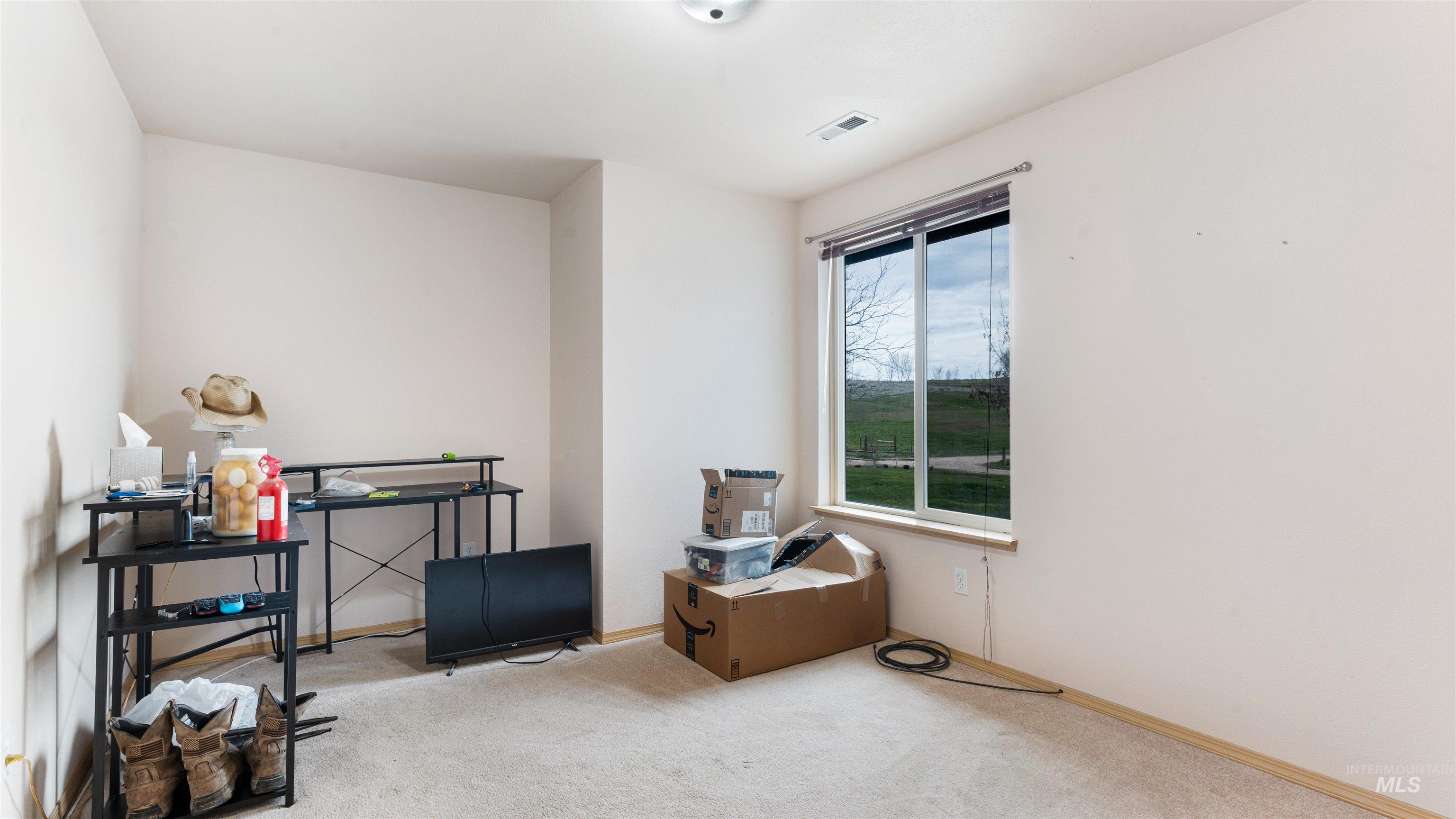 731 Tower Lane Caldwell, ID 83607 - Photo 36 of 38 Bedroom featuring carpet floors