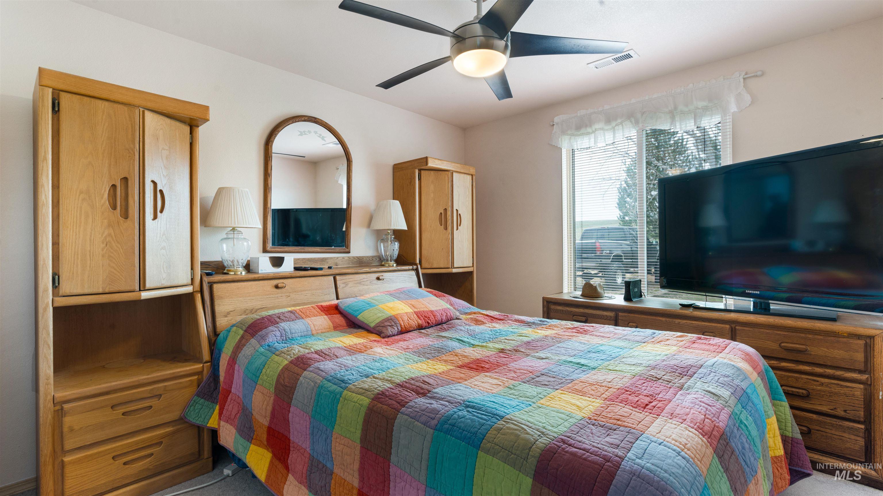 731 Tower Lane Caldwell, ID 83607 - Photo 37 of 38 Bedroom with ceiling fan