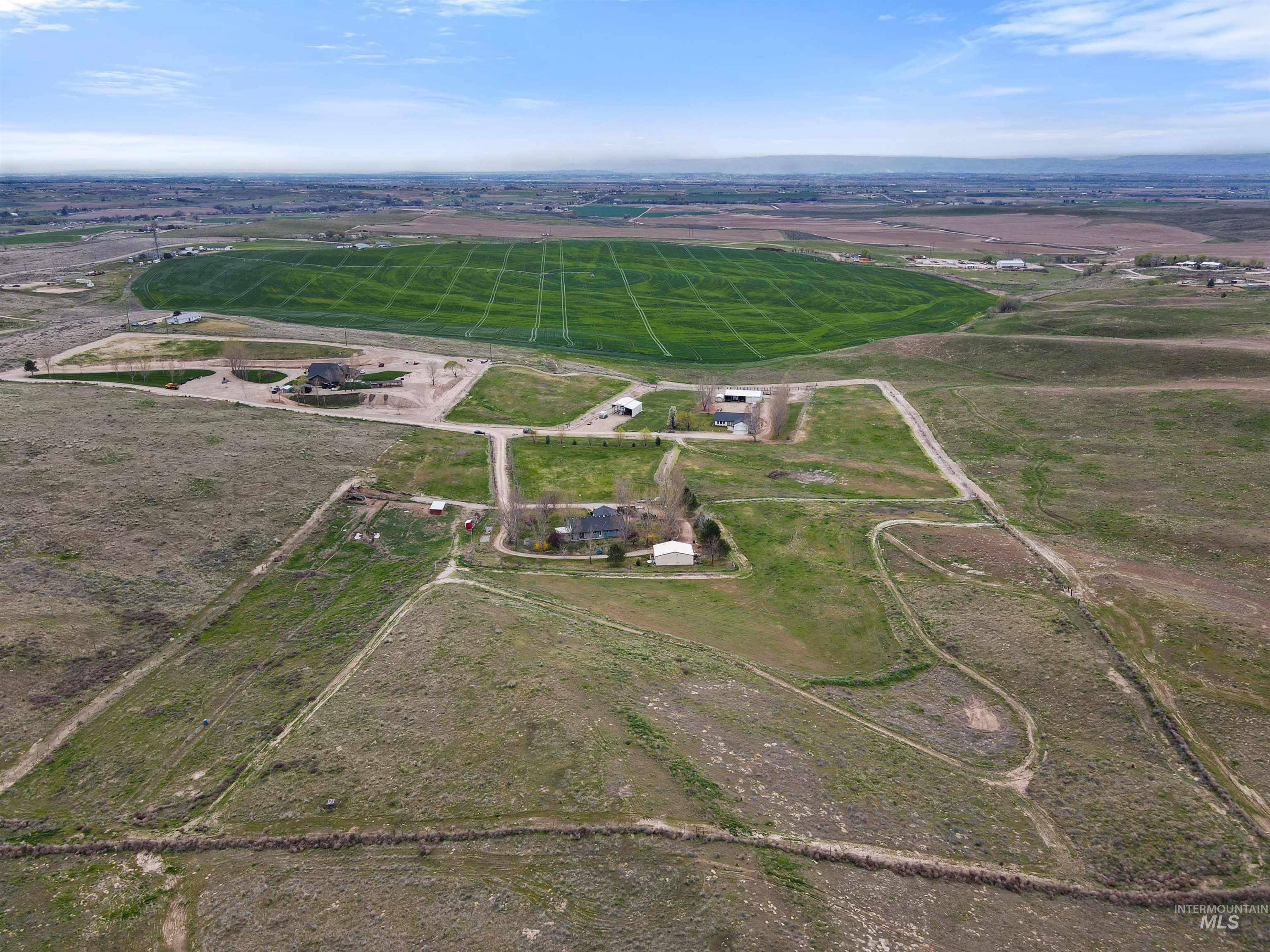 731 Tower Lane Caldwell, ID 83607 - Photo 4 of 38 Aerial view of property's location featuring rural landscape and abundant farmland