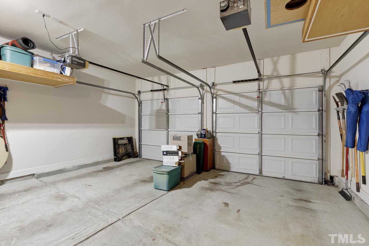 3917 Sunset Maple Court Raleigh, NC 27612 - Photo 36 of 54 a view of a garage with storage