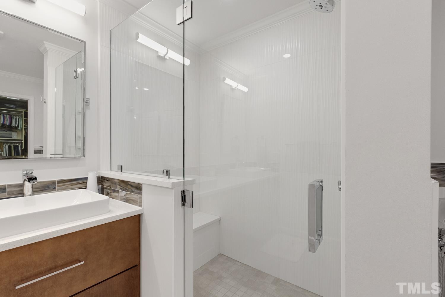 3917 Sunset Maple Court Raleigh, NC 27612 - Photo 44 of 54 a bathroom with a sink and a mirror