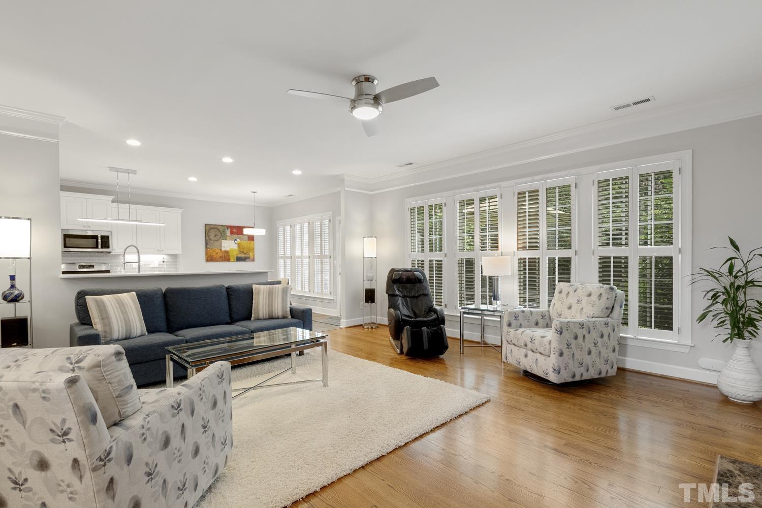 3917 Sunset Maple Court Raleigh, NC 27612 - Photo 5 of 54 a living room with furniture and a large window