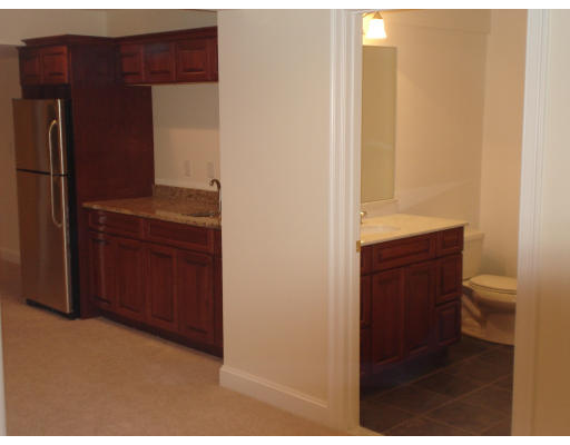 8 Scotland Road Lexington, MA 02420 - Photo 16 of 18 a bathroom with a toilet a sink and a mirror