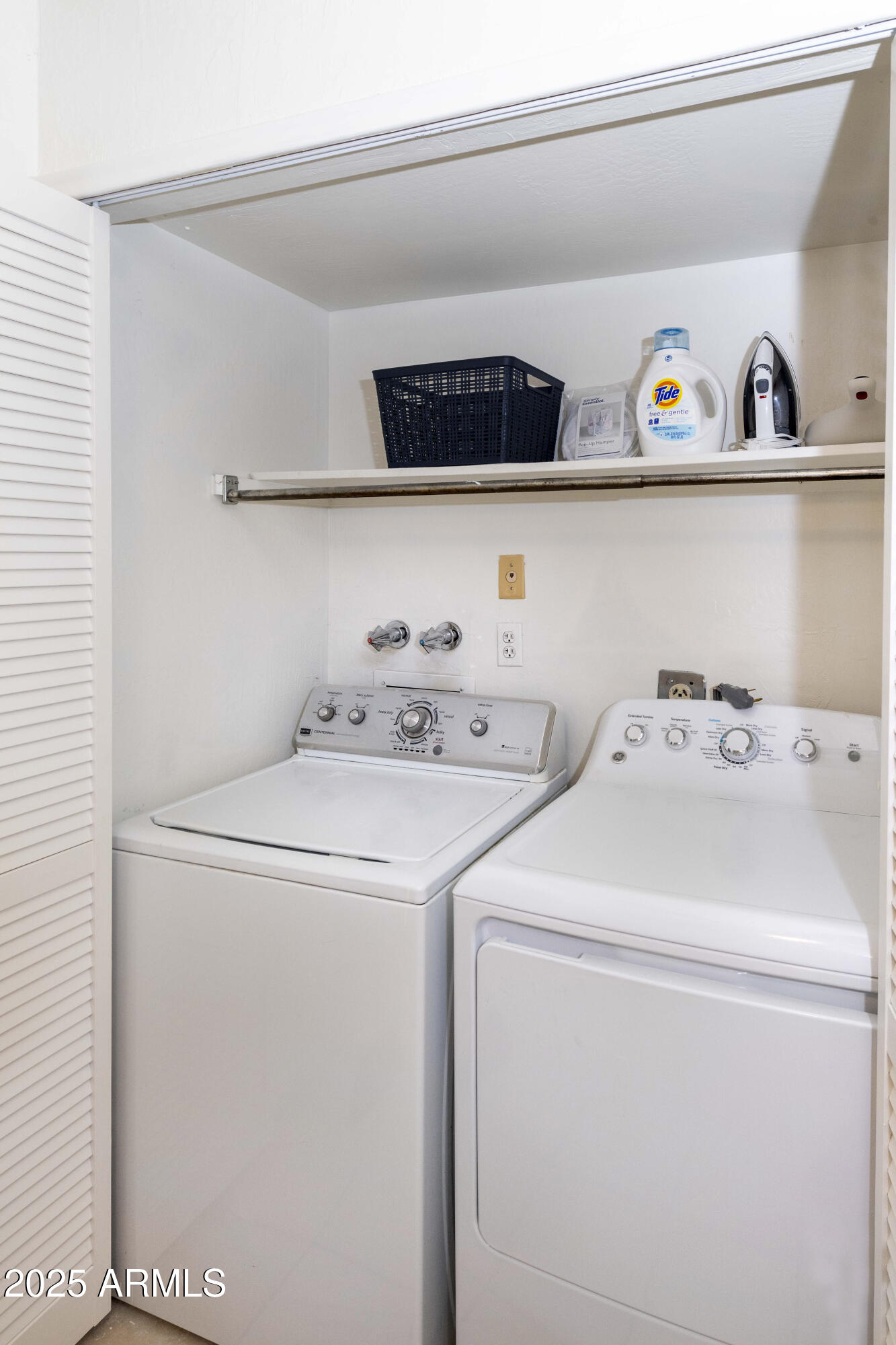 4446 East Camelback Road, Unit 109 Phoenix, AZ 85018 - Photo 17 of 42 a utility room with dryer and washer