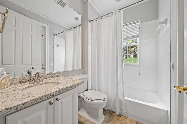 a view of swimming pool with a patio