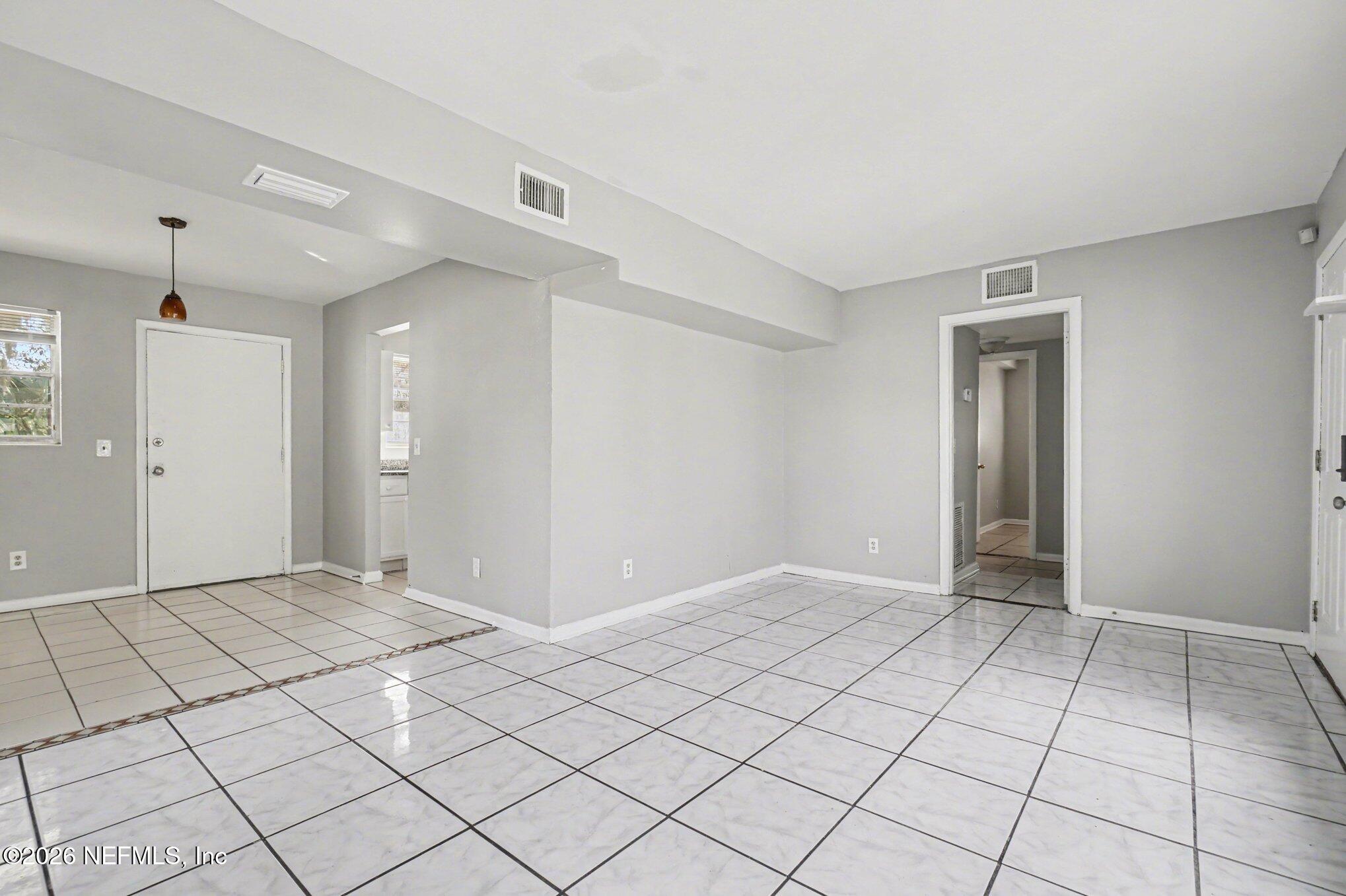 4852 Hatteras Road Jacksonville, FL 32208 - Photo 2 of 15 a view of an empty room
