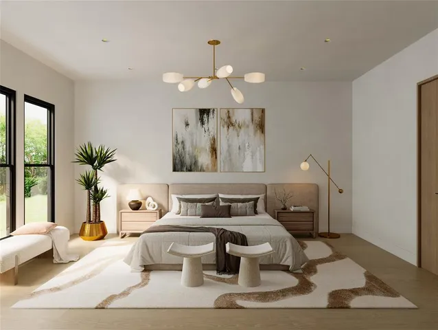 a spacious bedroom with a large bed and a large window