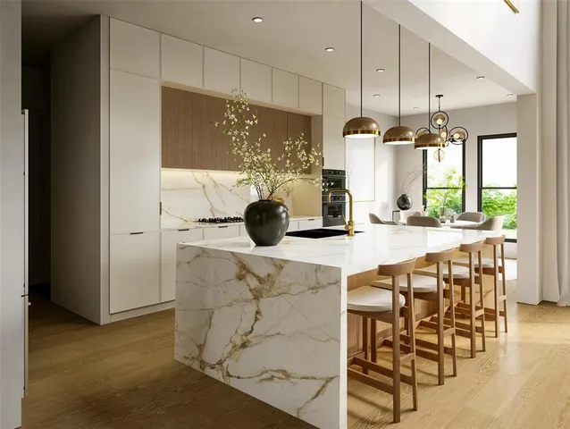 a kitchen with a table and chairs