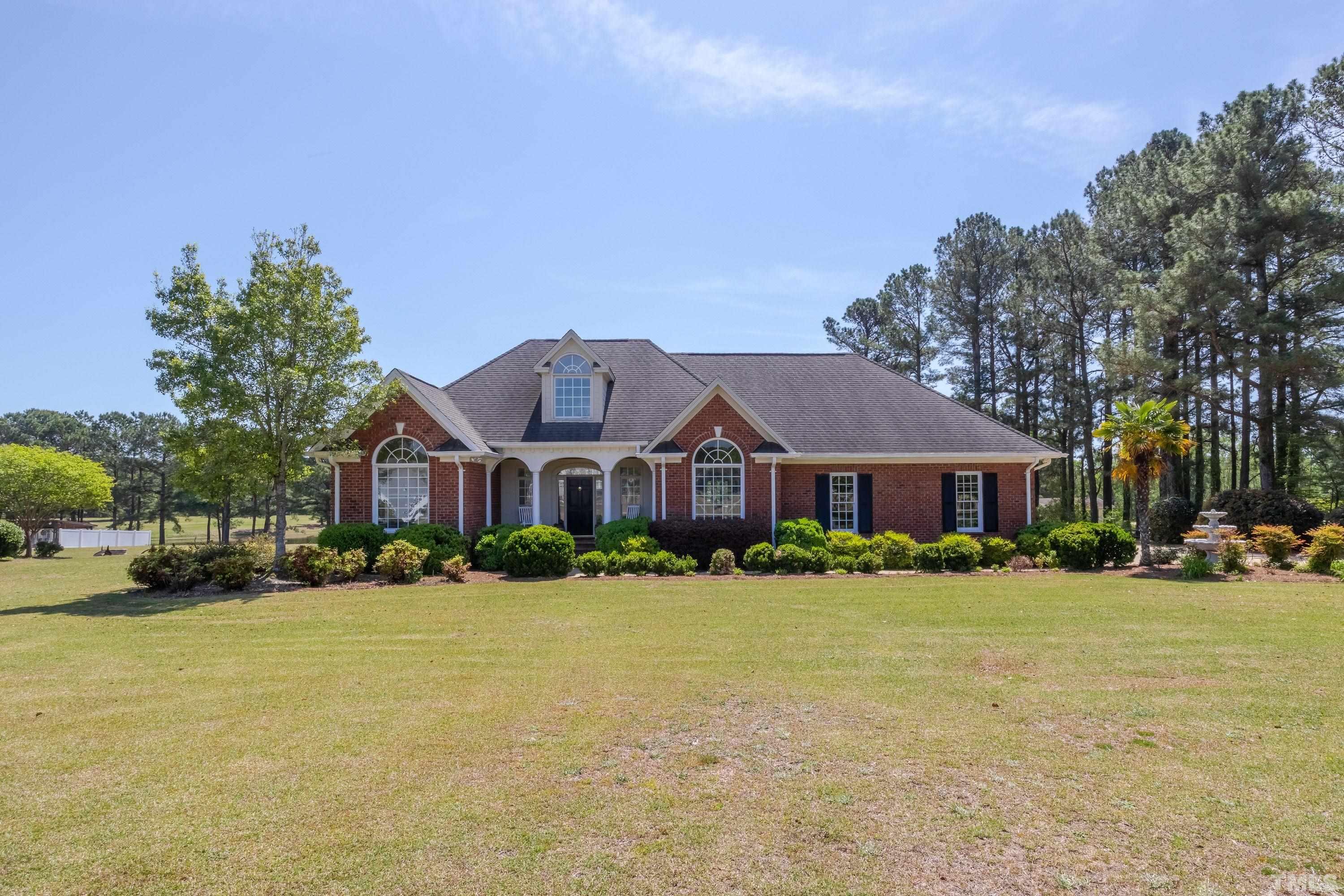 5646 Red Hill Church Road Coats, NC 27521 - Photo 31 of 31 a front view of a house with a yard