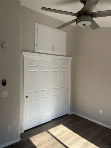 a view of a room with rack on the wall