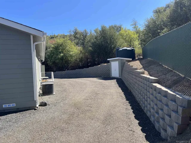 a terrace of a house with outdoor seating