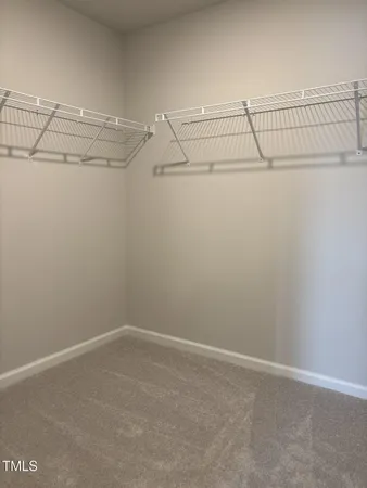 a view of swimming pool from a balcony